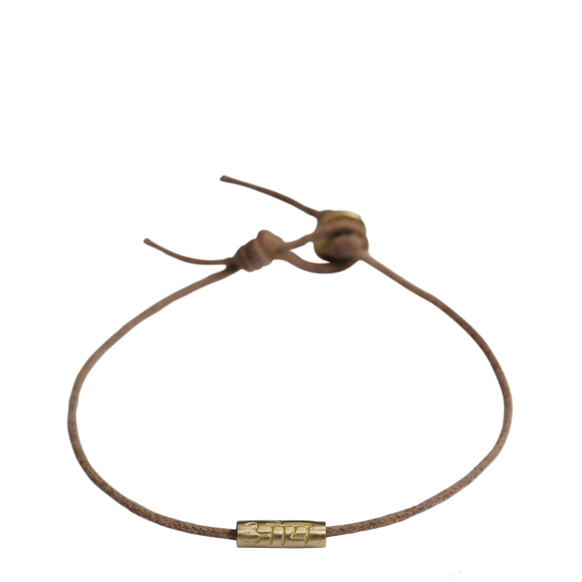 10K Gold Om Tube Bracelet on Natural Cord