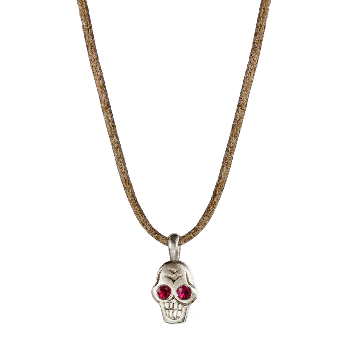 Sterling Silver Tiny Skull Pendant with Ruby Eyes on Natural Cord